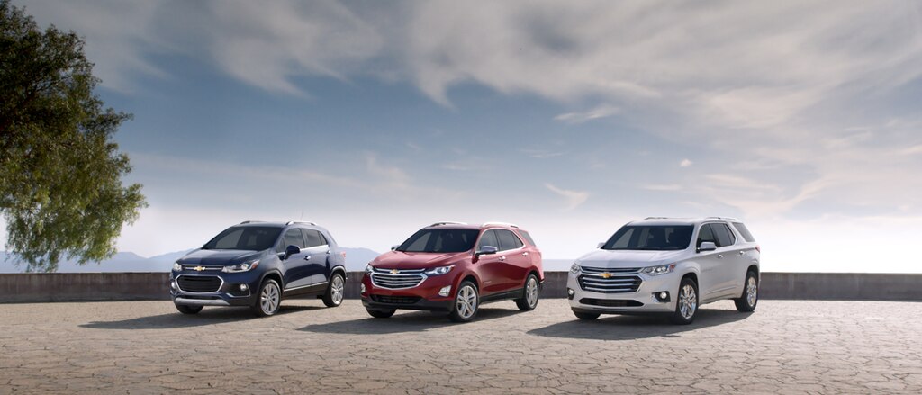 Las crossovers Trax, Equinox y Traverse de Chevrolet estacionadas una al lado de la otra.