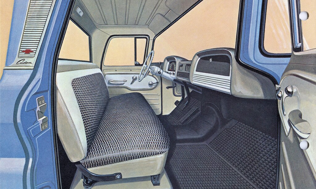 Una ilustración del folleto de la camioneta serie C/K 1962 mostrando el interior de la cabina de la camioneta.